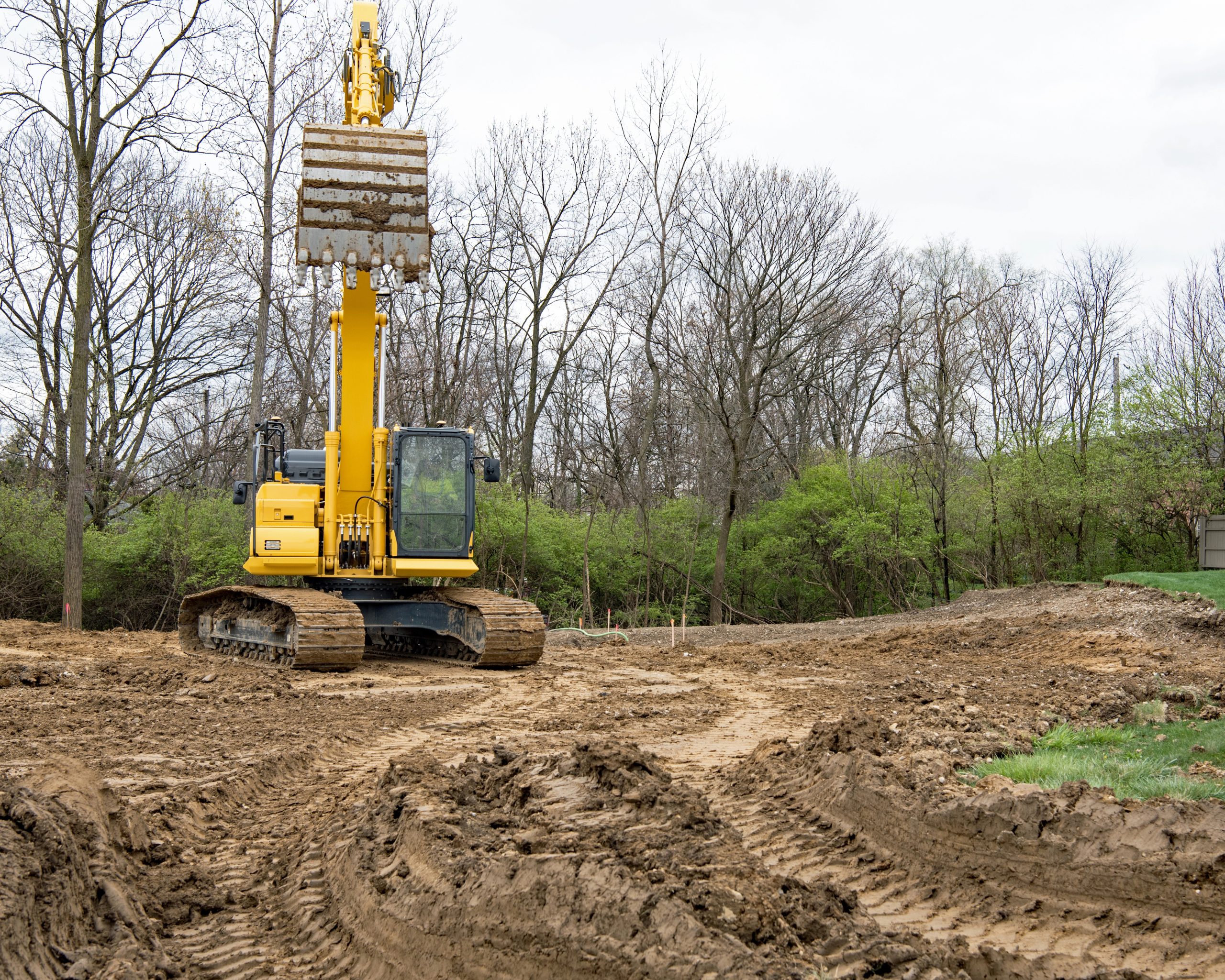 Excavator working on rural land